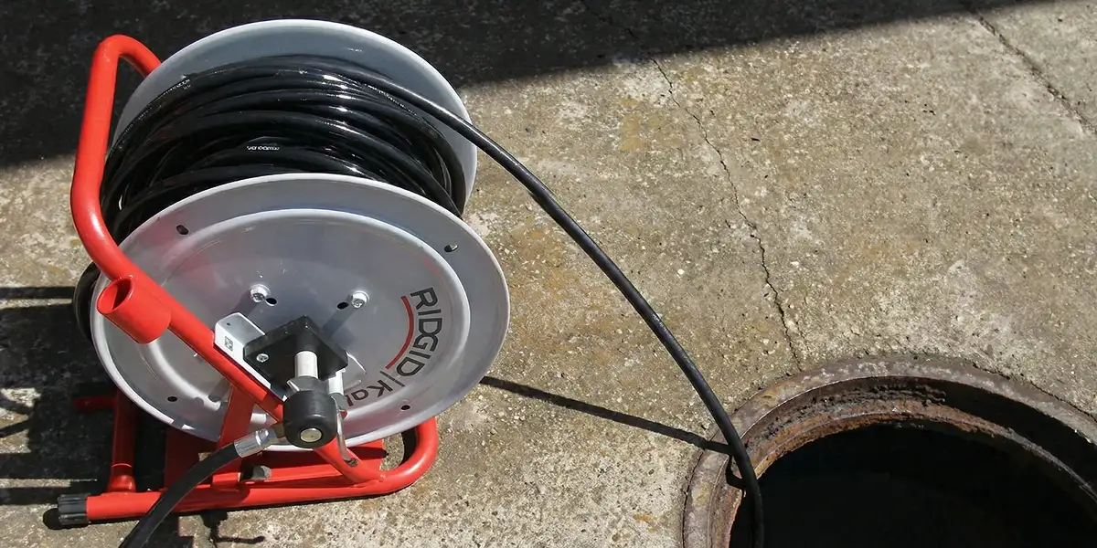 sewer rodding equipment prepared to clear clogged sewer lines in Mesa, AZ