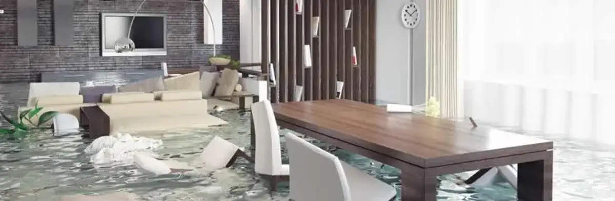 home interior affected by water damage with flooded floors and displaced furniture in Mesa, AZ